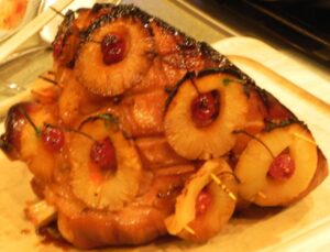 Smoked ham with pineapples and cherries.