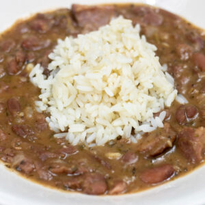 red beans with rice in a white bowl