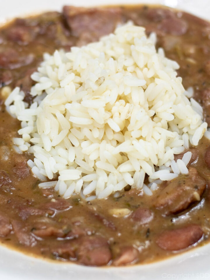 red beans with rice in a white bowl