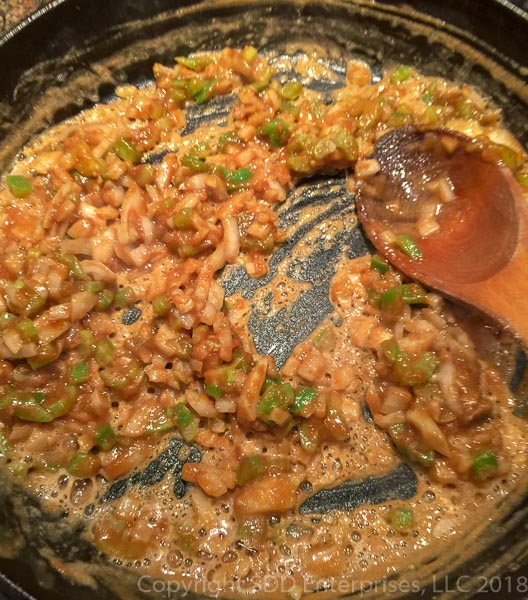 cooking onions, bell peppers and celery in a roux