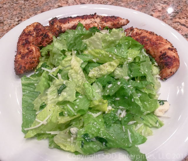 Sensation Salad with Grilled Chicken on a white plate