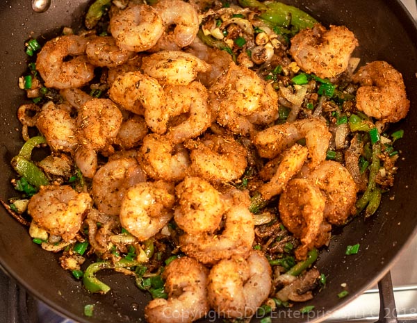 Sauteed shrimp with onions and peppers and spices