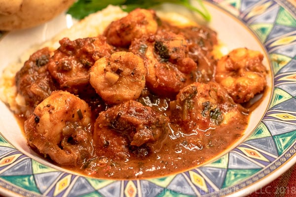 Shrimp and Grits in a green bowl