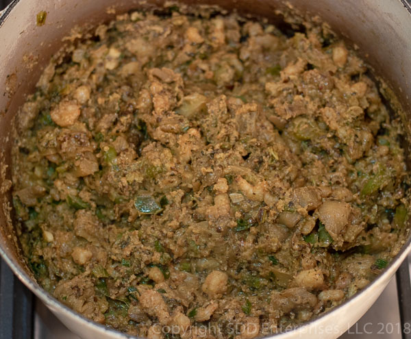 Cooked eggplant, vegetables and shrimp in dutch oven