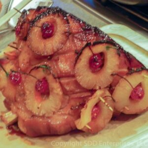 Baked Ham with pineapples and cherries and glaze