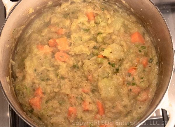 Carrots and mirlitons in dutch oven