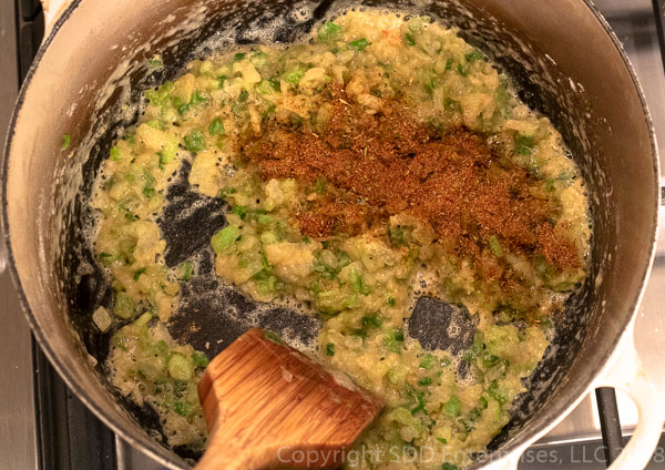 Creole Seasoning added to roux, onions and celery