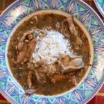 turkey oyster gumbo in a bowl with white rice