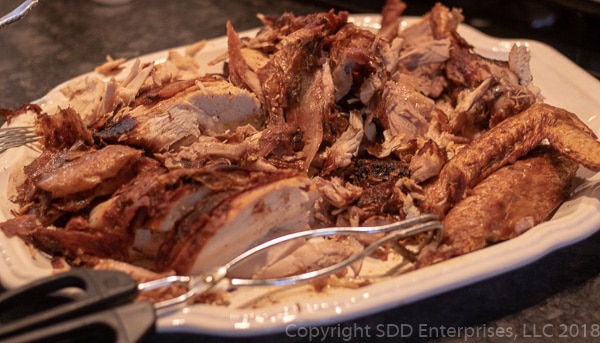 sliced fried turkey on a platter