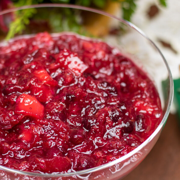 cranberry relish in a glass bowl with Christmas decorations