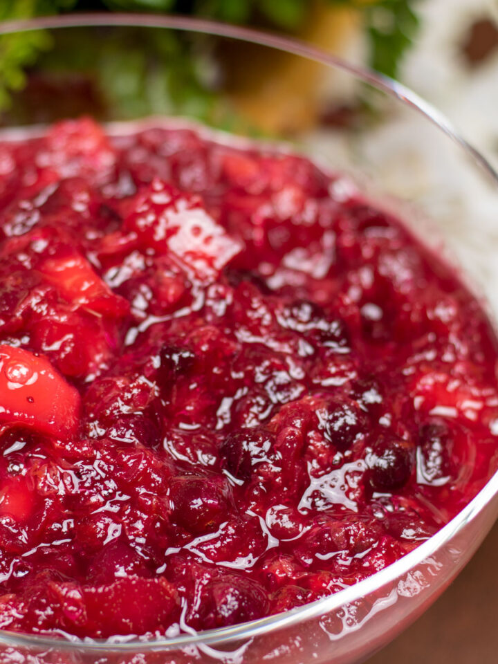 cranberry relish in a glass bowl with Christmas decorations