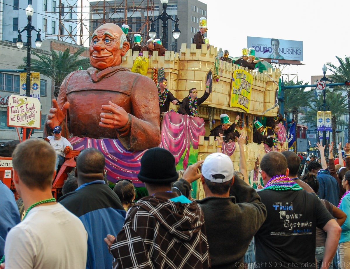 Mardi Gras float and crowd on Canal Street