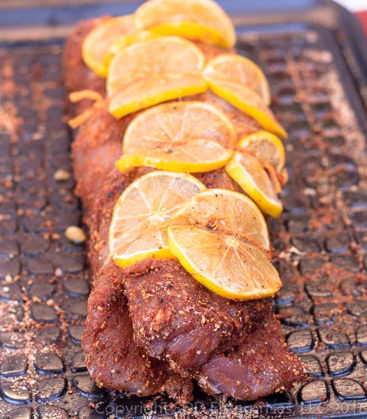 Pork tenderloin rubbed and tied with Meyer lemon slices