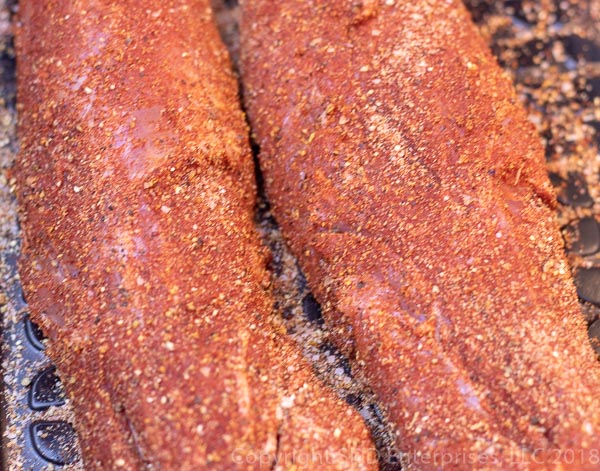 two pork tenderloins with dry rub