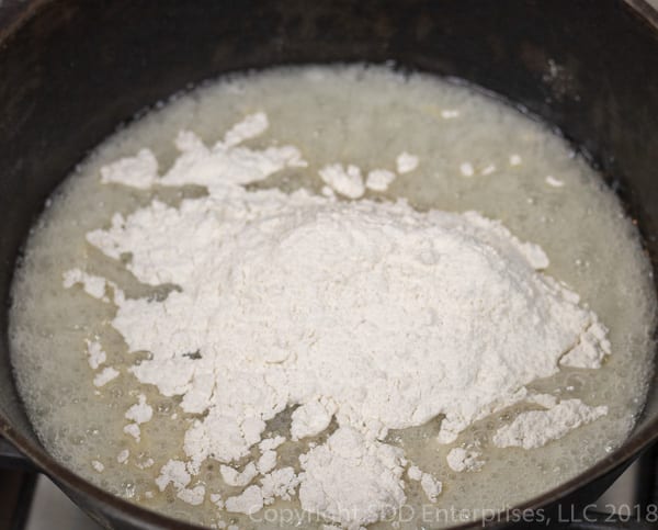 added flour to hot oil to make a roux for shrimp and okra gumbo