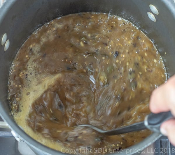 stirring the veggies into boiling stock for Shrimp and Okra Gumbo