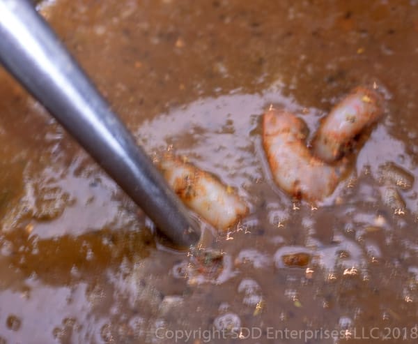 adding shrimp to Shrimp and Okra Gumbo