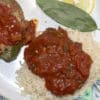 creole sauce served over rice with stuffed pepper and lemon and bay leaf