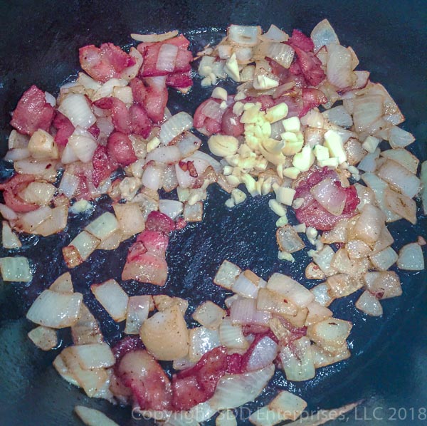 added garlic to the sauteing onions in the dutch oven