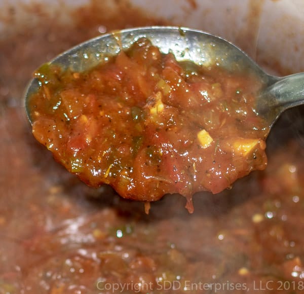 Creole sauce on a spoon