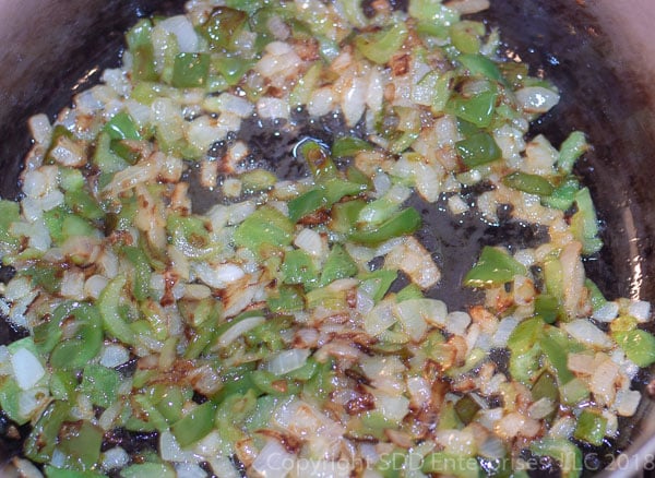 sauteeing the trinity for creole sauce in a dutch oven