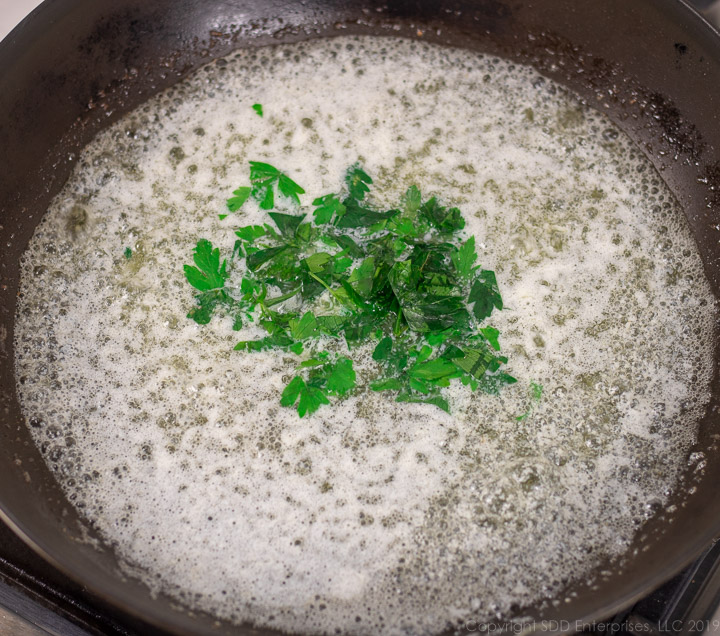 chopped parsley added to the melting butter for meuniere sauce