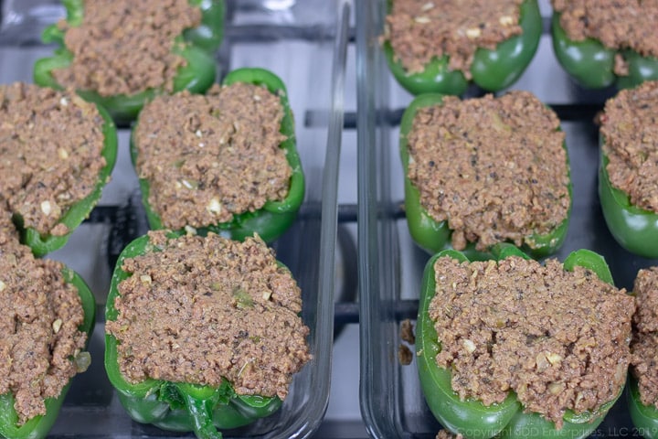 stuffed bell peppers in a baking dish
