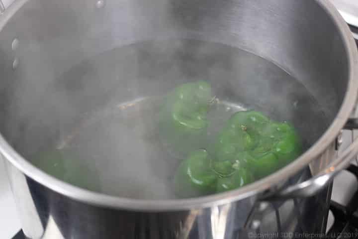 green bell peppers being parboiled