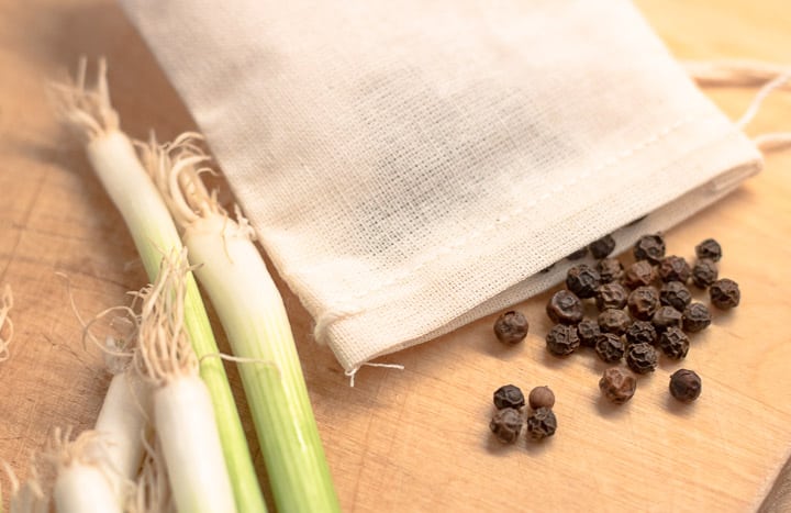 black peppercorns in a garni-bag