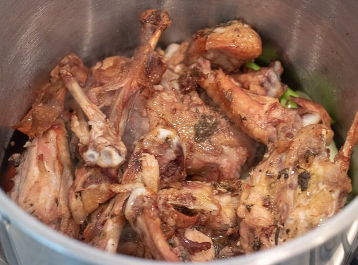 turkey bones added to the stockpot for turkey stock