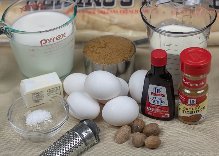french bread, milk, cream, butter, eggs and spices for bread pudding