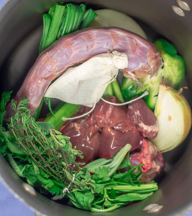 ingredients for turkey stock in a stock pot for oyster dressing