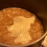 turkey stock boiling in a stock pot