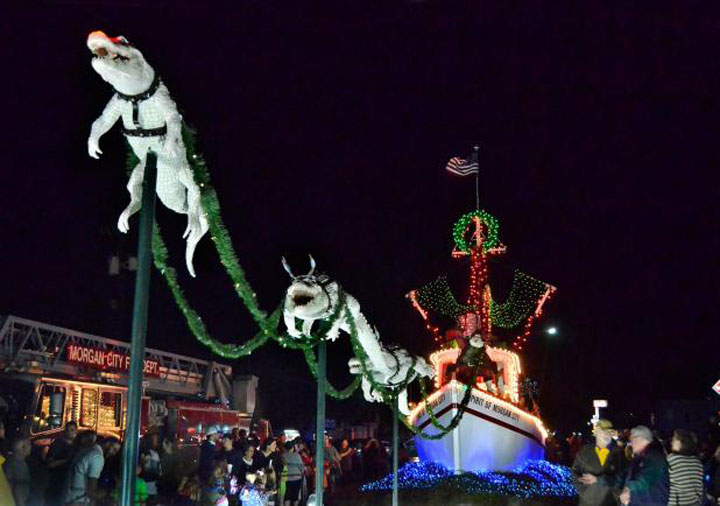 the spirit of morgan city with santa and alligator reindeers