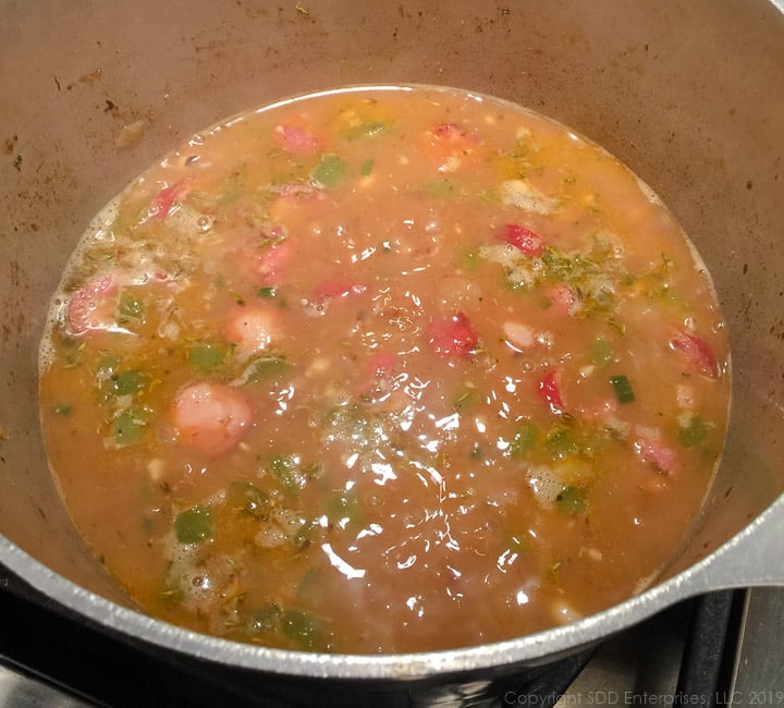 black-eyed peas simmerig in a stockpot