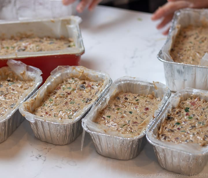 Aluminum baking tins prepared and filled with Fruitcake mix.