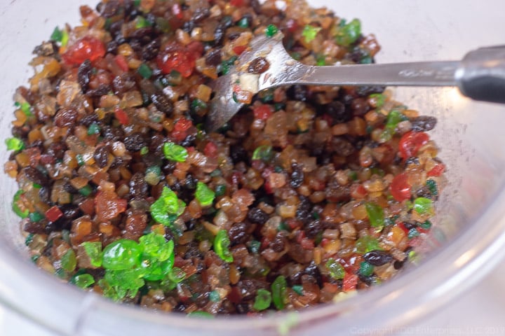 mixed candied fruit in a bowl with brandy.