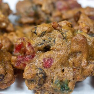 several fruitcake cookies, or Christmas Lizzies on a white plate