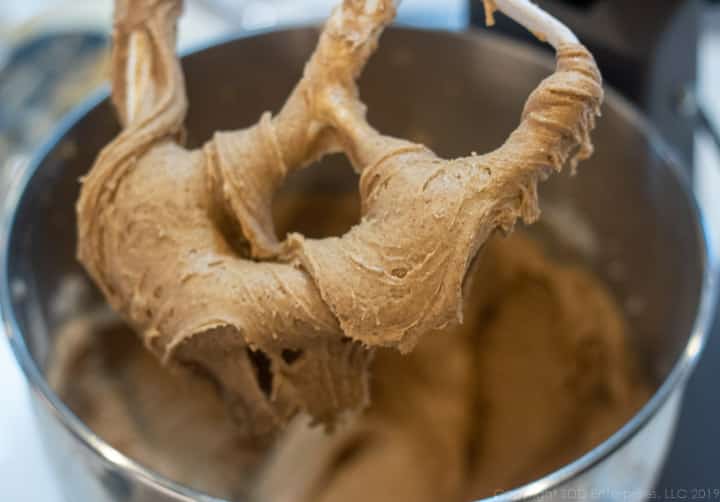 batter for fruitcake cookies on a mixing paddle