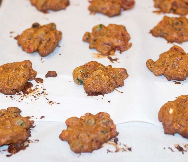 fruitcake cookies on a baking sheet right from the oven