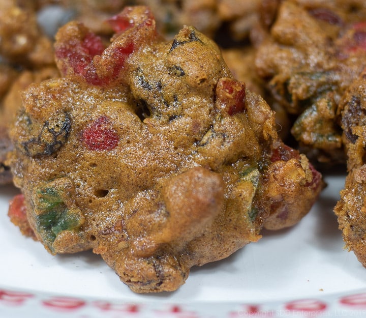 several fruitcake cookies, or Christmas Lizzies, on a white plate