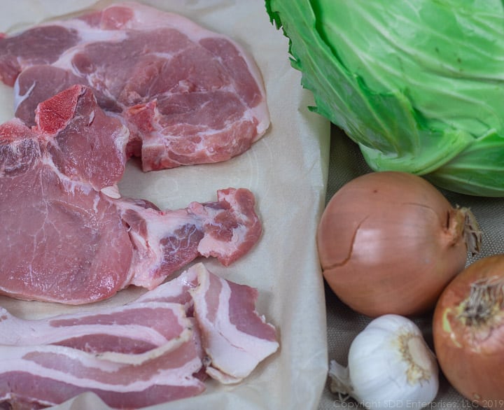pork chops, bacon, onions and garlic for smothered cabbage