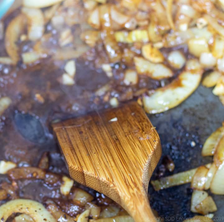 deglazing the dutch oven for smothered cabbage