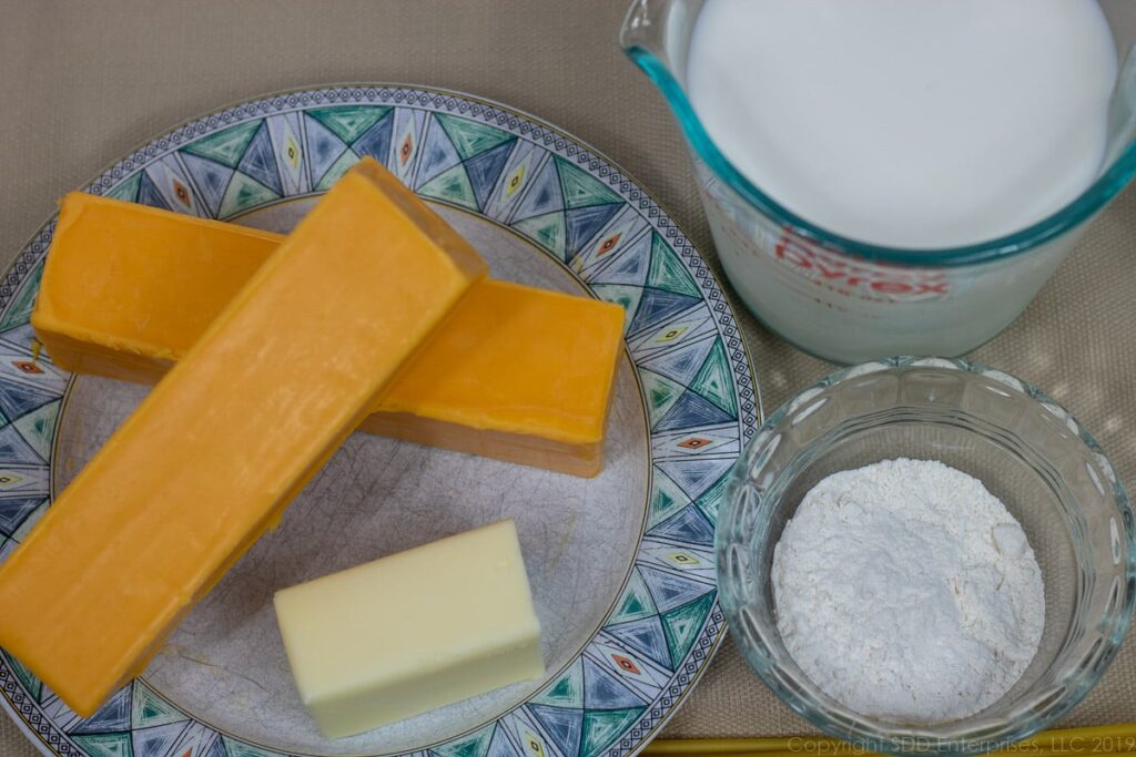 sharp cheddar cheese, butter and whole milk for macaroni and cheese