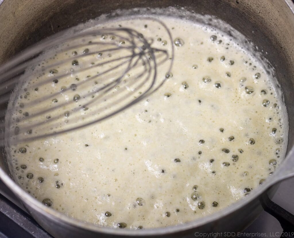 blond roux in a skillet for macaroni and cheese