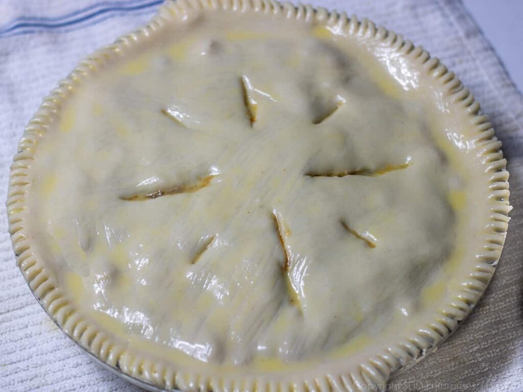 uncooked crawfish pie ready for the oven