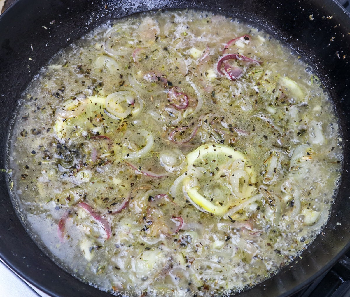 white wine added to sauteing shallots and aromatics in a skillet