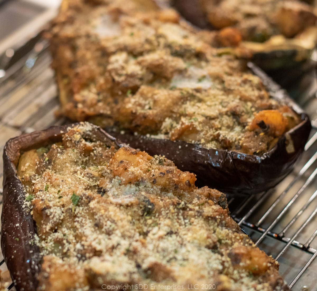 shrimp stuffed eggplant on a cooling rack right out of the oven