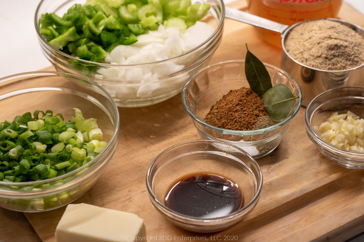 ingredients for stuffed eggplant completely prepped and in individual prep bowls