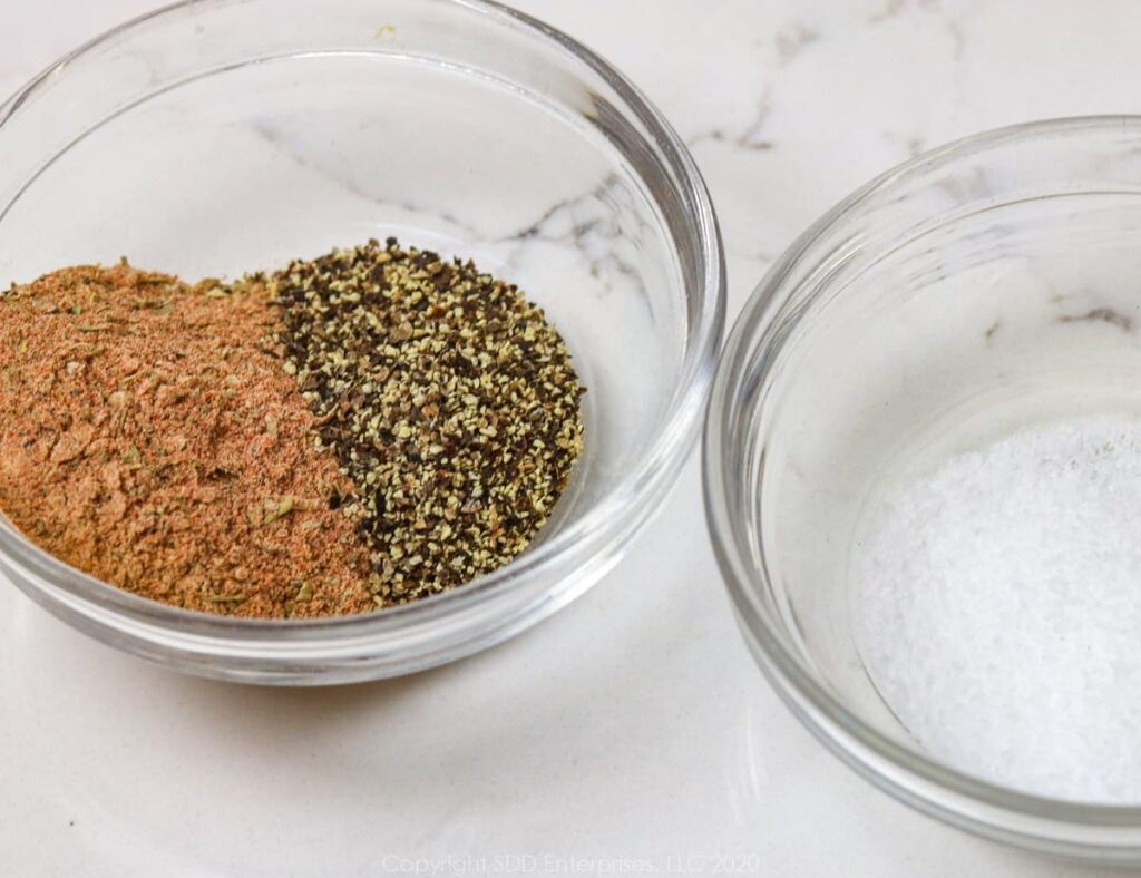 creole seasoning and black pepper in a small bowl and kosher salt in a small bowl